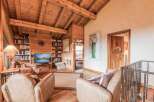 Step into a cozy haven with this stunning property, boasting a warm and inviting wooden interior.