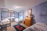 Discover a charming bedroom with a unique design.