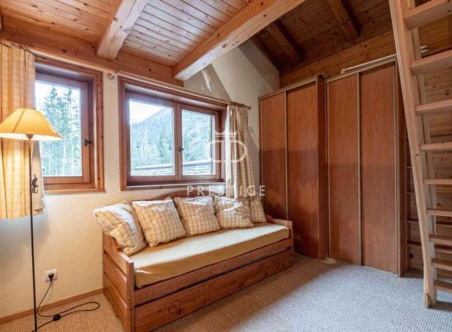 Cozy cabin retreat with stunning mountain views.
