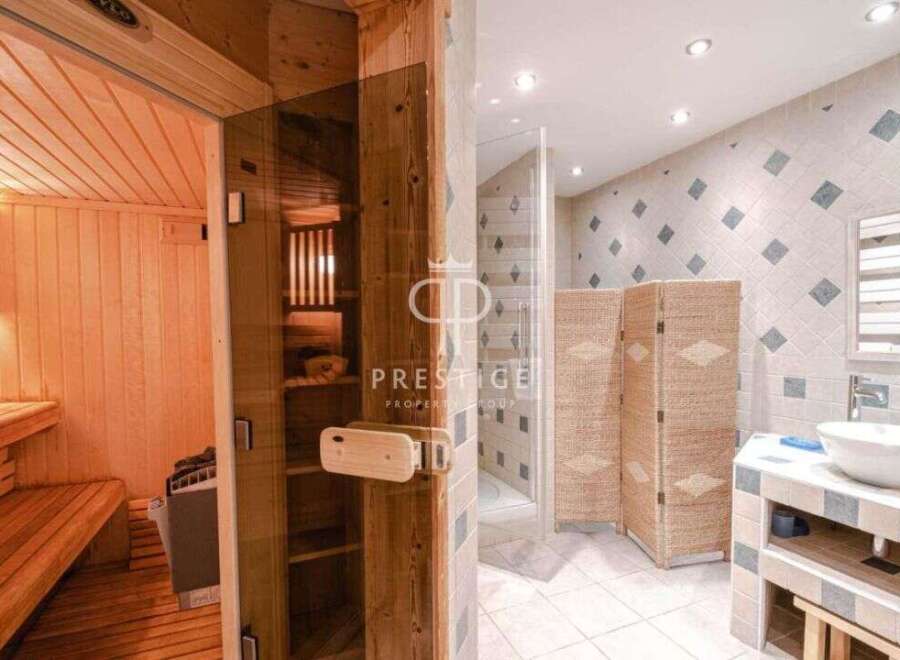 Discover luxury living with this stunning property featuring a private sauna, perfect for relaxation.