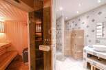 Discover luxury living with this stunning property featuring a private sauna, perfect for relaxation.