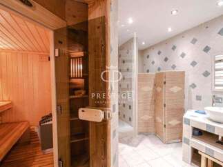 Discover luxury living with this stunning property featuring a private sauna, perfect for relaxation.