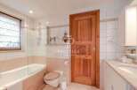 Discover a luxurious bathroom with a warm and inviting ambiance.