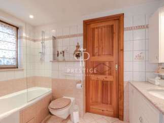 Discover a luxurious bathroom with a warm and inviting ambiance.