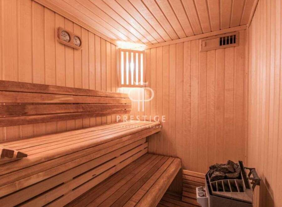 Step into relaxation with this stunning sauna.