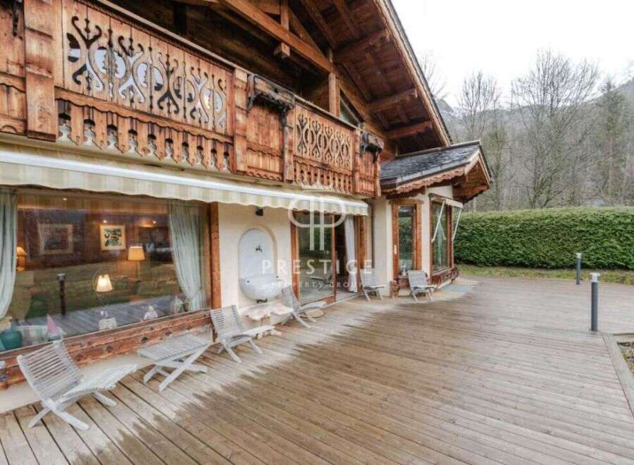 Discover the charm of this exquisite wooden chalet, boasting intricate architectural details and a warm, inviting ambiance.