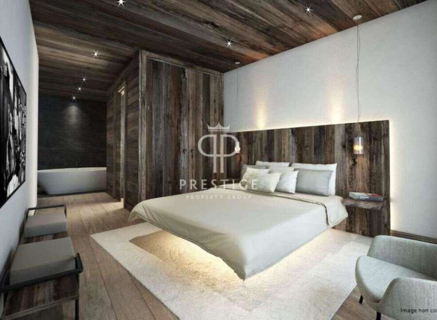Experience luxury in this stunning bedroom featuring a unique floating bed design.