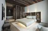Experience luxury in this stunning bedroom featuring a unique floating bed design.