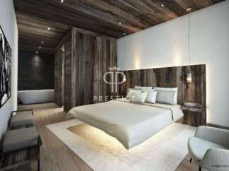 Experience luxury in this stunning bedroom featuring a unique floating bed design.