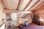 Discover the charm of this stunning property, showcasing exquisite wooden architecture and a cozy ambiance.