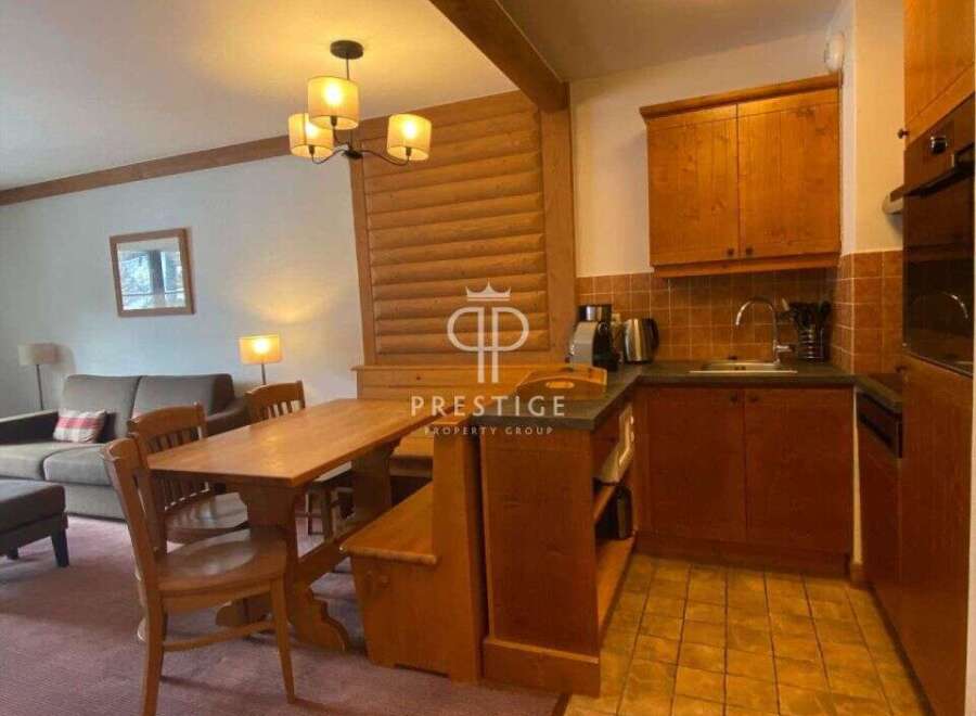 Discover the charm of this property, featuring a cozy dining area perfect for intimate gatherings.
