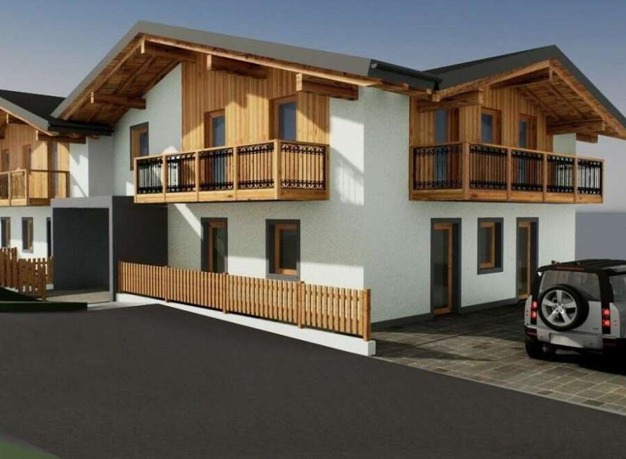 Discover your dream home! This stunning property boasts a modern design with a touch of rustic charm, featuring beautiful wooden accents and balconies.