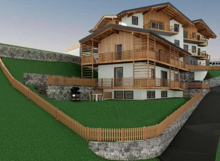 Discover your dream retreat in this stunning property! Featuring a beautiful wooden facade and multiple balconies, this home offers breathtaking views.