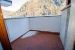 Enjoy breathtaking mountain views from this charming balcony.