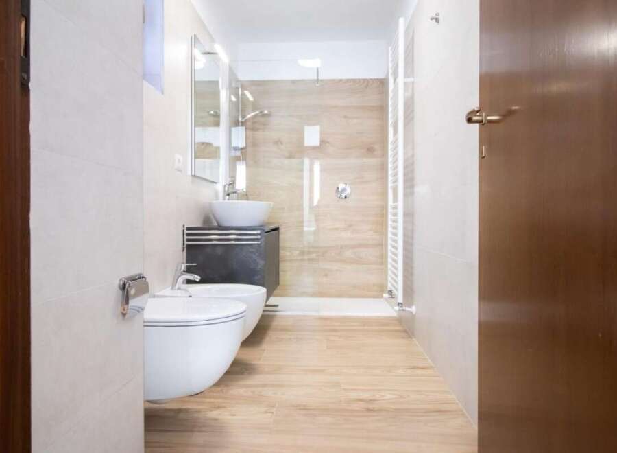 Step into a modern bathroom with sleek design.
