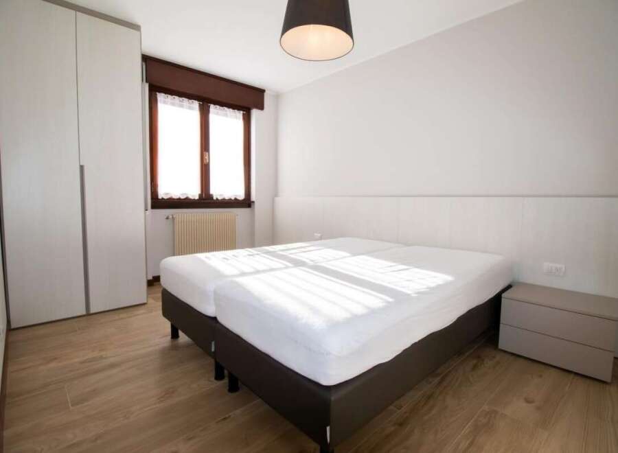 This cozy bedroom features a comfortable bed, perfect for a relaxing stay.