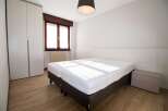 This cozy bedroom features a comfortable bed, perfect for a relaxing stay.
