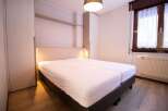 Discover a cozy bedroom featuring a comfortable bed, perfect for a relaxing stay.
