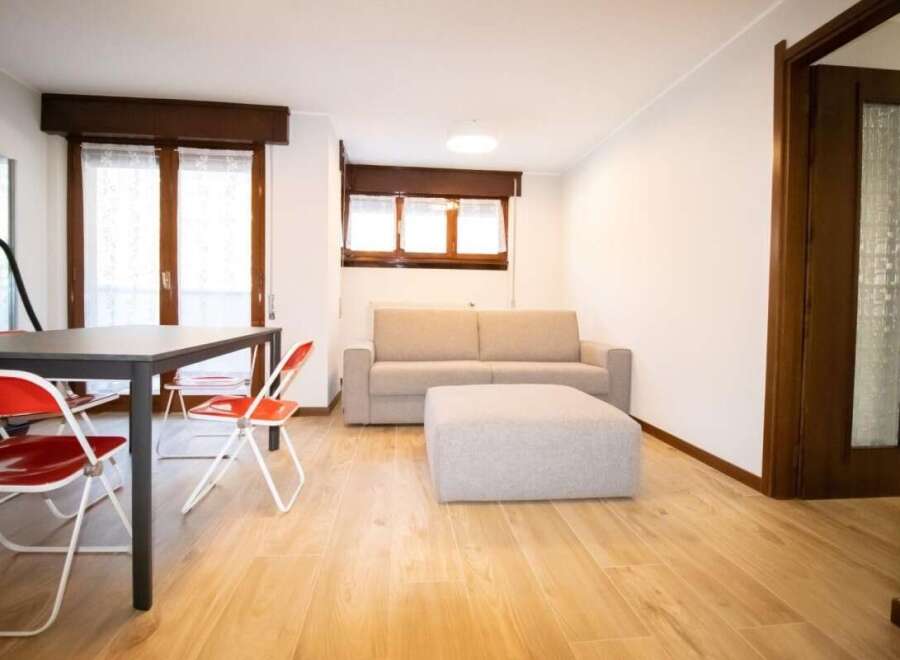 Discover a bright and airy living space with beautiful wooden floors.