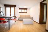 Discover a bright and airy living space with beautiful wooden floors.