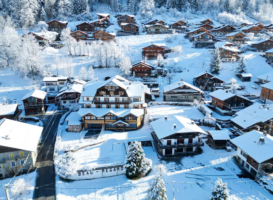 Discover the charm of Beau-Regard Hotel, nestled in a picturesque winter wonderland.