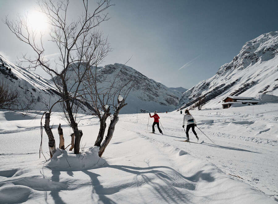 Experience the serenity of mountain living in this picturesque winter wonderland.