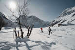 Experience the serenity of mountain living in this picturesque winter wonderland.