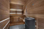 Step into relaxation in this stunning sauna.