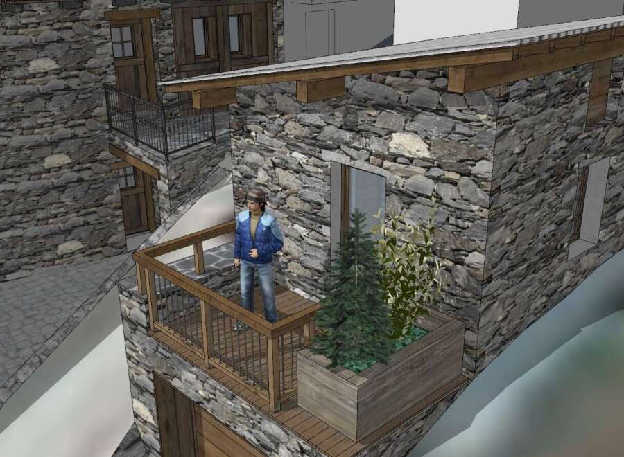 Discover the charm of this stone-clad property, featuring a balcony with a stunning view.
