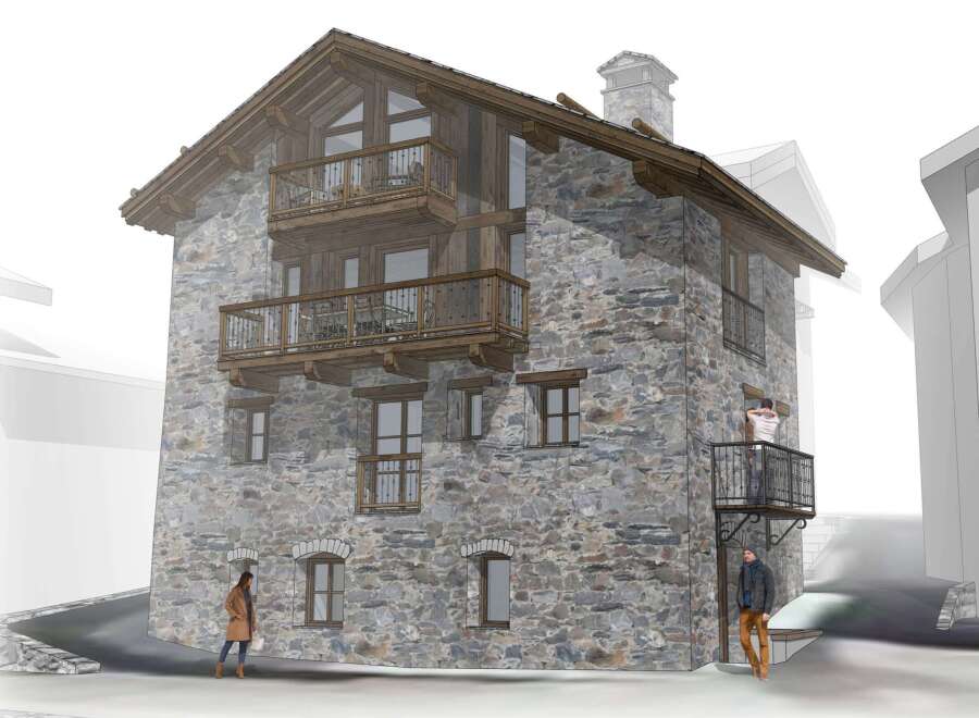 This stunning stone-clad building boasts a charming alpine design, complete with multiple balconies offering breathtaking views.