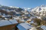 Experience the charm of a snow-covered village nestled in the heart of the mountains.