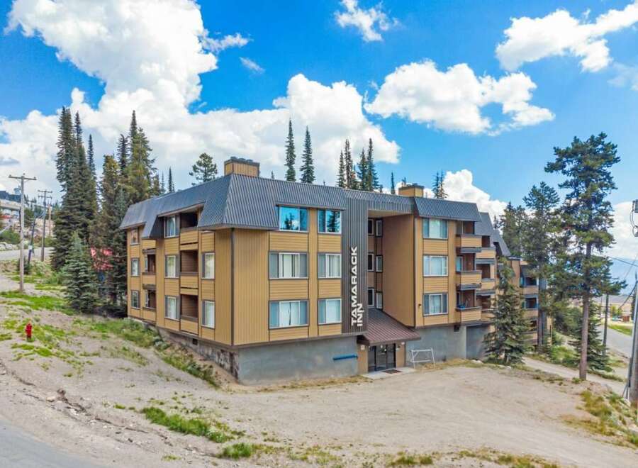 Discover the charm of Tamarack Inn, a stunning property nestled in a picturesque setting.