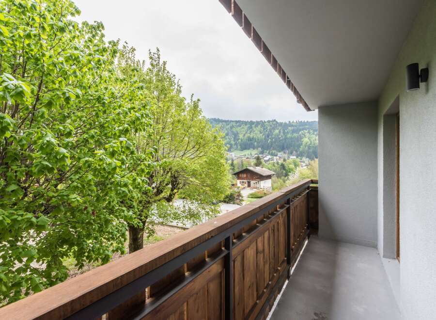 Enjoy breathtaking views from this charming balcony.