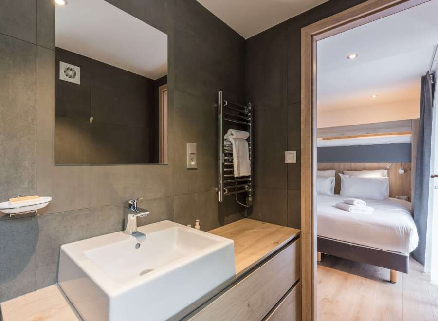 Step into a modern bathroom with sleek design.