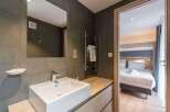Step into a modern bathroom with sleek design.