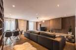 This stunning living space boasts a modern design with a cozy atmosphere.