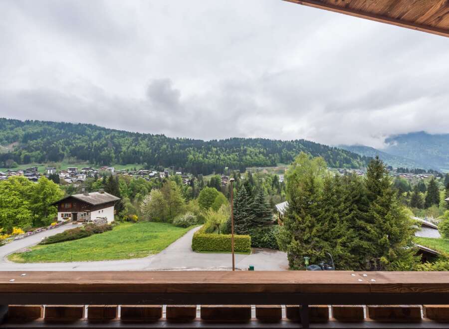 Enjoy breathtaking mountain views from this charming property.