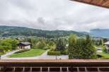 Enjoy breathtaking mountain views from this charming property.