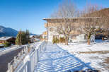 Discover a charming property nestled in a picturesque winter wonderland.