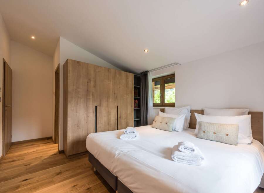 Discover the epitome of comfort in this beautifully designed bedroom.
