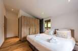 Discover the epitome of comfort in this beautifully designed bedroom.