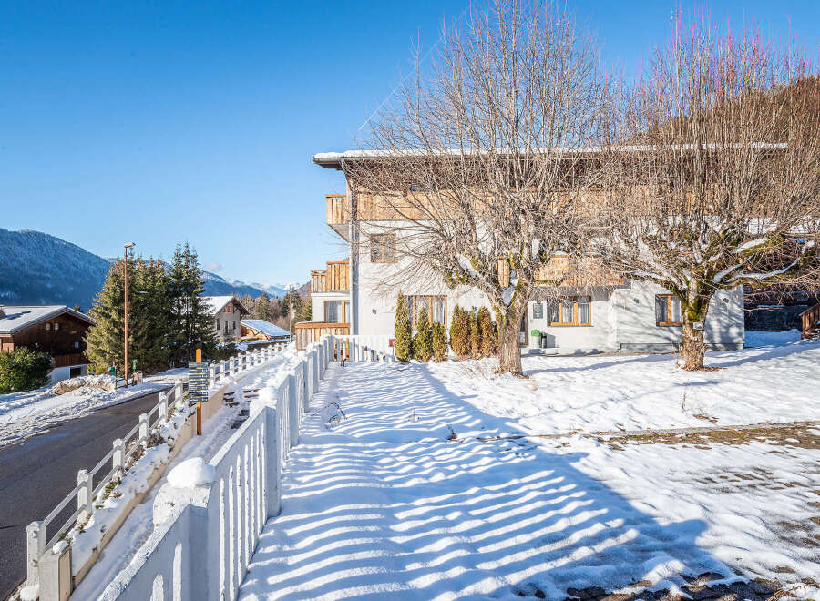 Discover a charming property nestled in a picturesque winter wonderland.