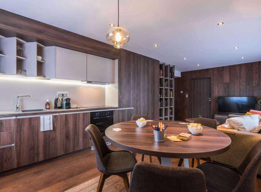 This modern apartment boasts a stylish open-plan living space, perfect for entertaining.