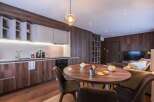 This modern apartment boasts a stylish open-plan living space, perfect for entertaining.