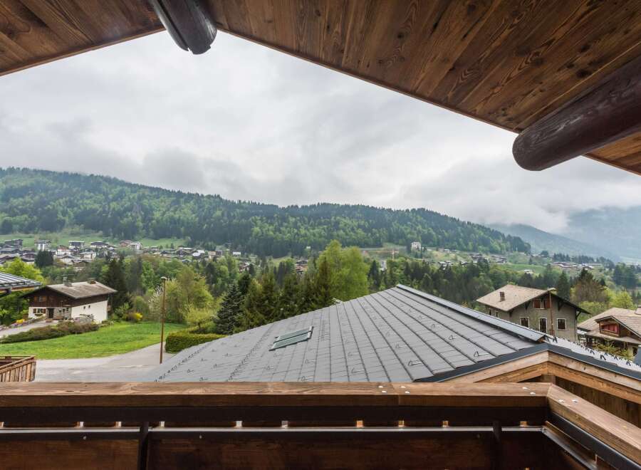 Enjoy breathtaking mountain views from this charming property.
