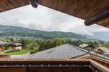 Enjoy breathtaking mountain views from this charming property.