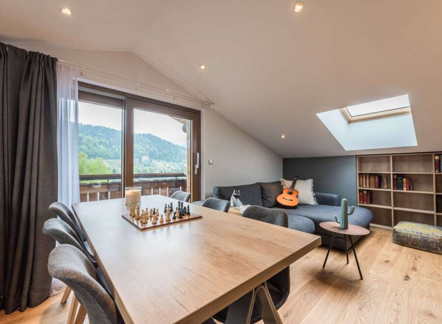 This stunning living space boasts a modern design with a touch of rustic charm.