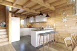 Step into a cozy cabin kitchen, where rustic charm meets modern design.