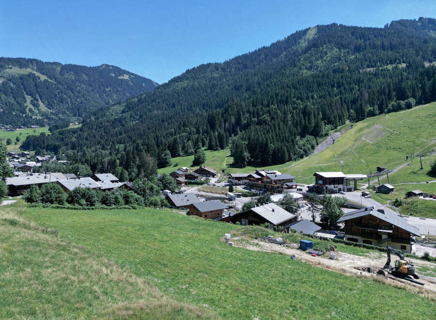 Nestled in a picturesque mountain valley, this property offers stunning views of the surrounding landscape.