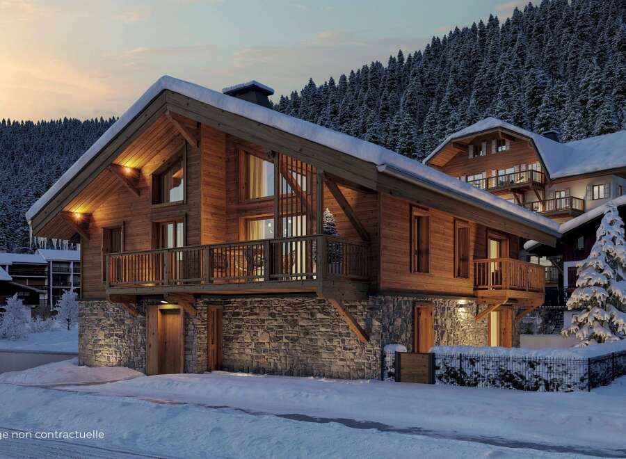 Experience the charm of a cozy wooden chalet nestled in a snowy landscape.
